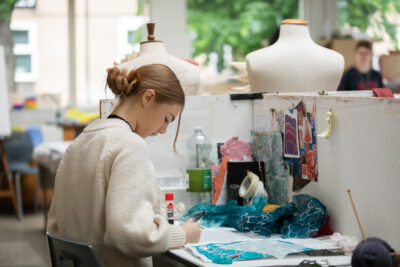 student working at desk