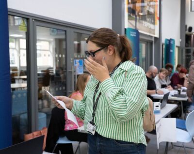 Nicola looking at her results